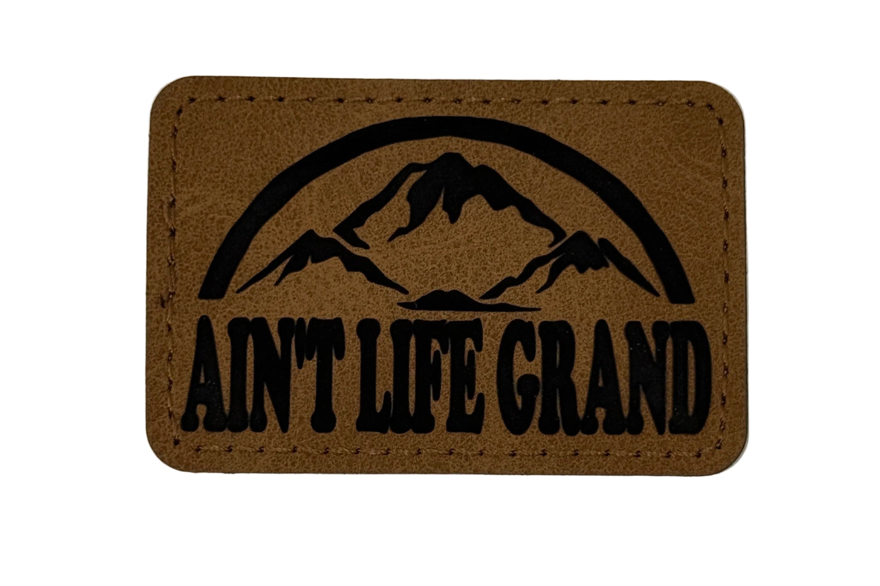 Ain't Life Grand Mountains Patch 3x2 | Laser Engraved | Rawhide/Black | Iron or stitch | Panic Fan Art