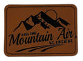 Kiss The Mountain Air Patch 3.5” x 2.5” | Laser Engraved | Rawhide/Black | Iron or stitch | Panic Fan Art
